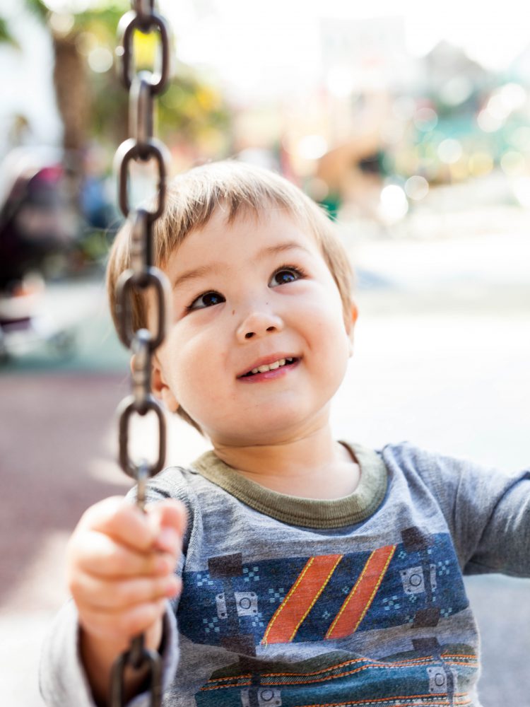 kid on a swing