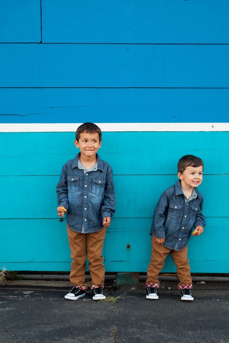 boys in matching denim outfits