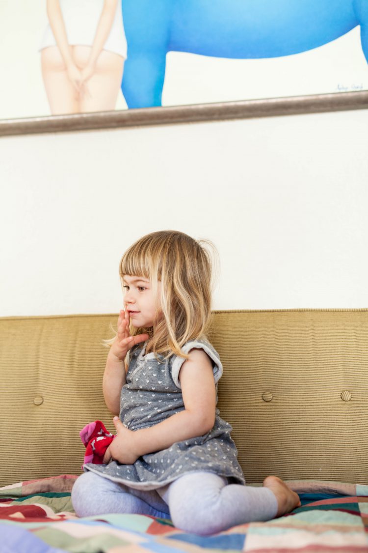 girl on a gold sofa