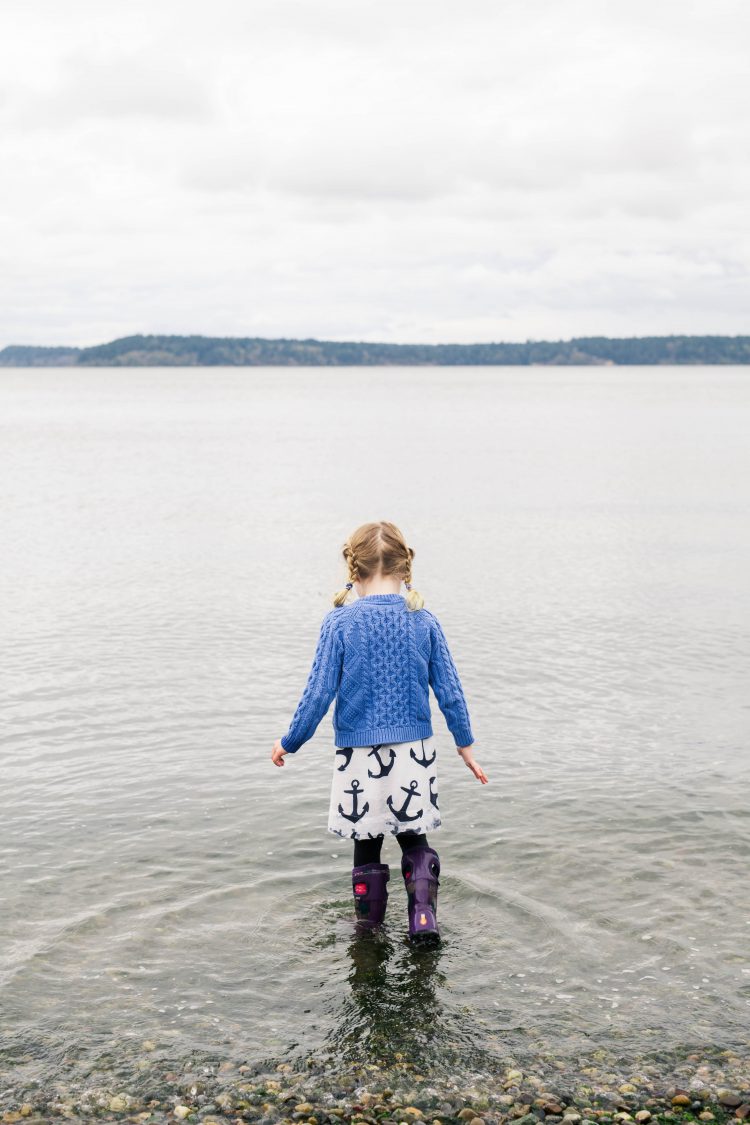 girl playing in the bay