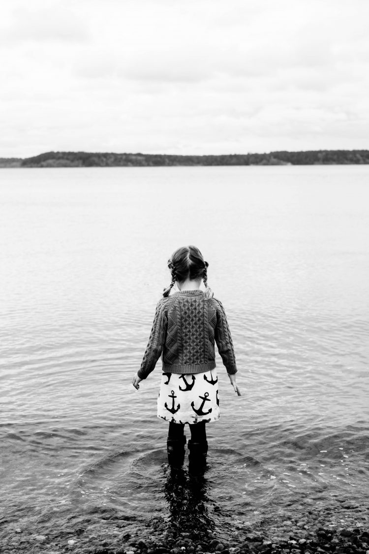 girl wading in the Puget Sound