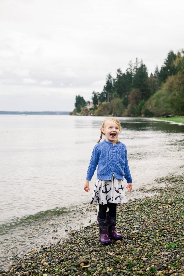 happy girl by the water