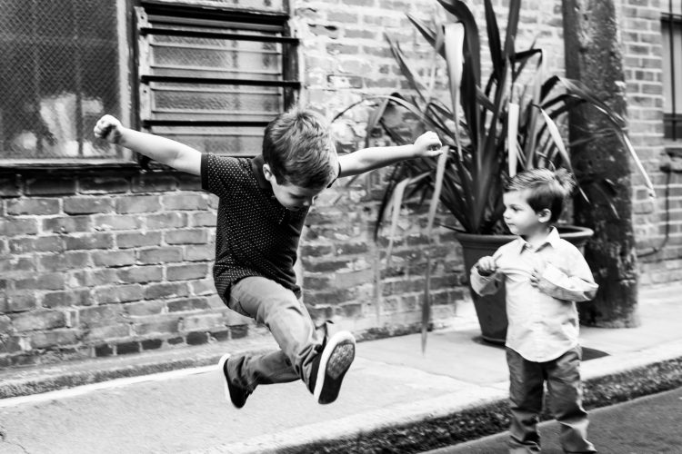boys playing and jumping